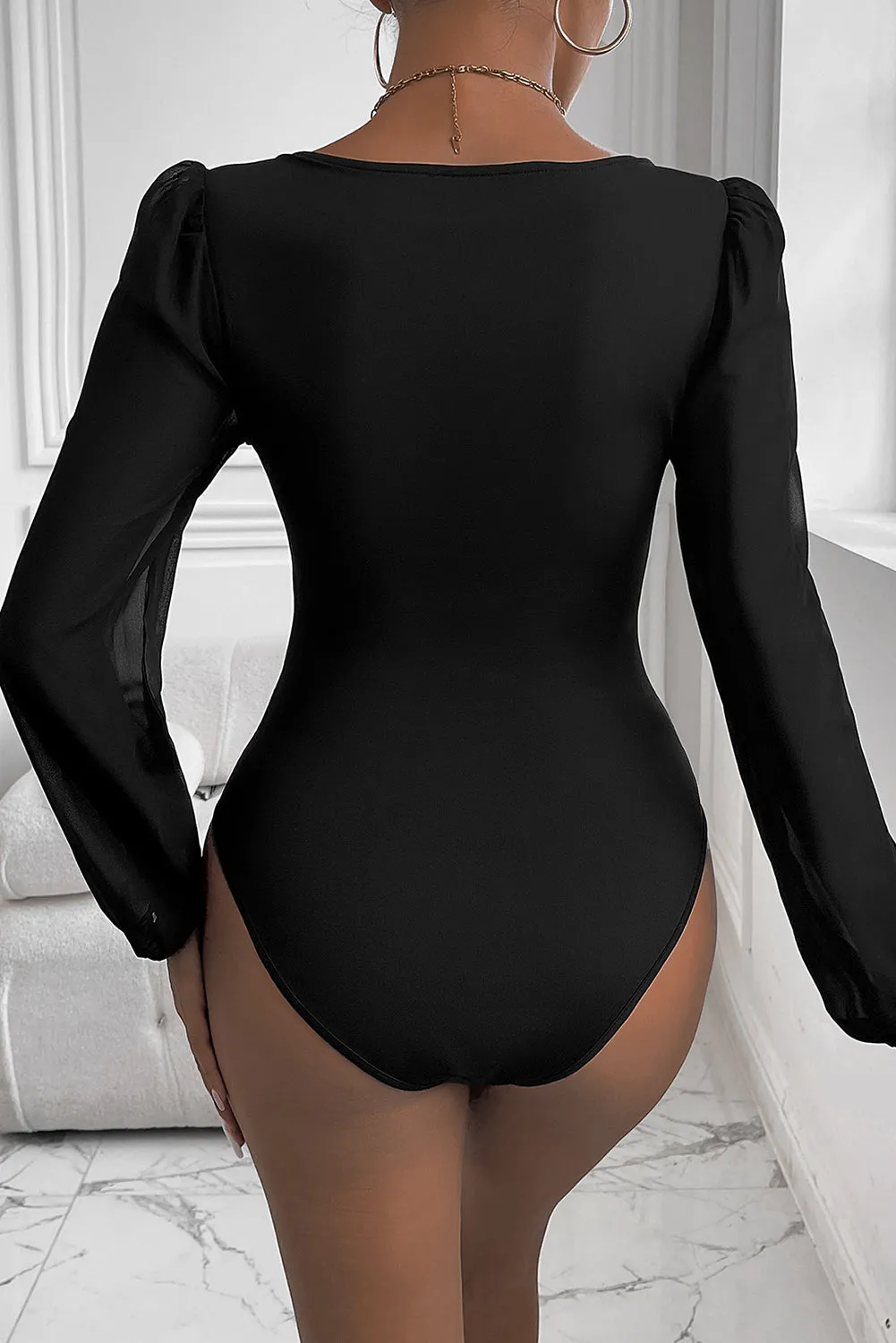 Black V-Neck Long Sleeve Bodysuit – Sleek, Stylish, and Oh-So Versatile!